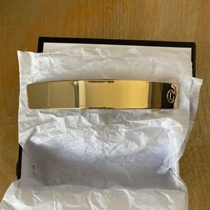 Leonor Greyl large gold logo hair barrette